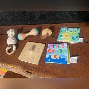 Lovevery wooden toys and crinkle books